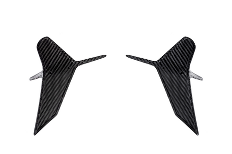 Two symmetrical, carbon fiber aerodynamic winglets are displayed, pointing slightly outward, set against a plain white background.