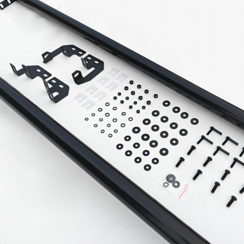 Assorted black metal brackets, screws, and washers are neatly arranged on a white surface, with two long black rails framing the top and bottom.