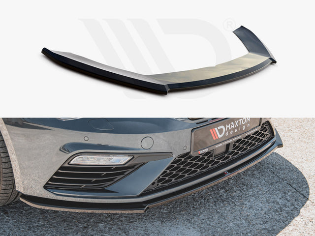A black car splitter is displayed; above, as an isolated object, and below, installed on a car's front bumper. The bumper is labeled "MAXTON design" with a hexagonal grille pattern. The car is parked on a stone surface.