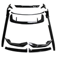 Black car body kit components, including spoilers and side skirts, are arranged on a white background. The parts are neatly organized, showcasing their glossy finish and aerodynamic design.