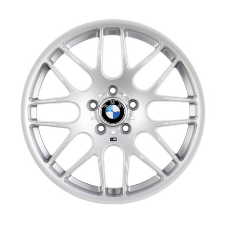 A silver alloy wheel with a BMW logo at the center, displaying multiple spokes, set against a plain white background.
