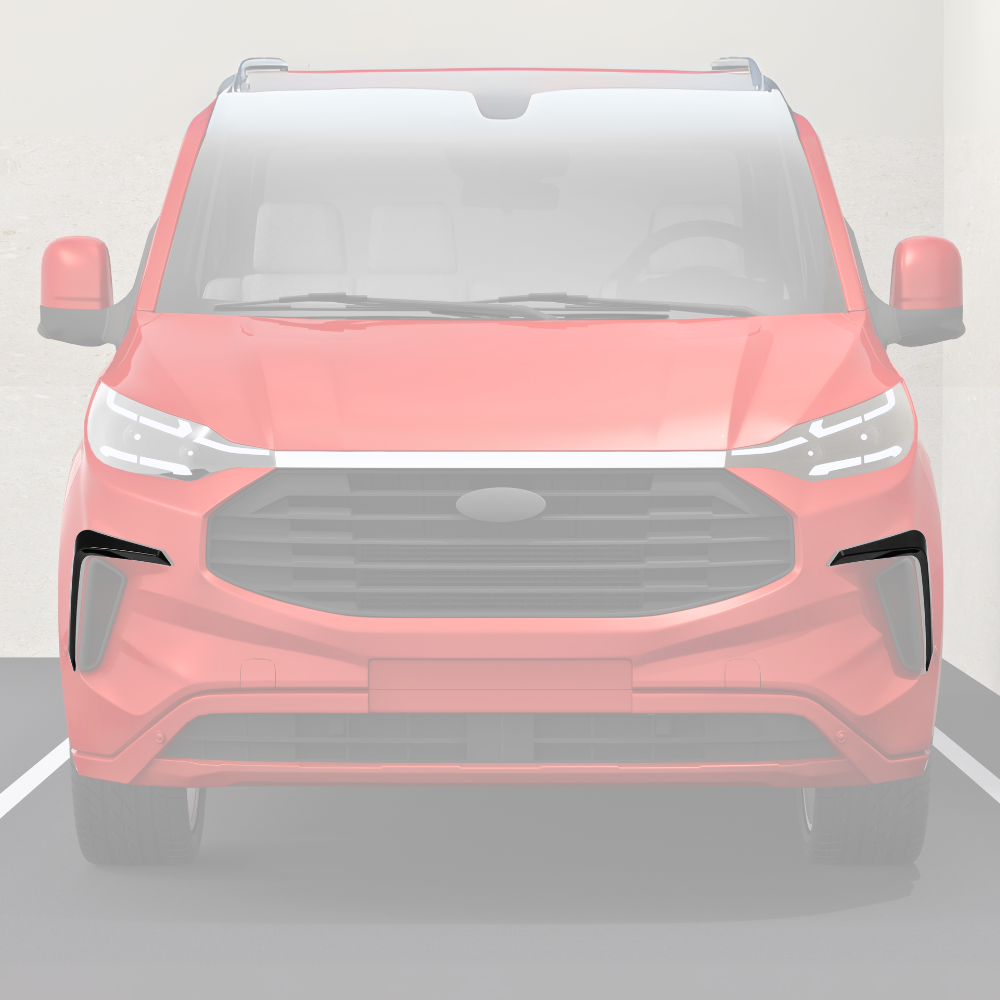 A red car is parked in a parking space, viewed head-on, displaying a large grille and modern headlights. The background shows a concrete wall.