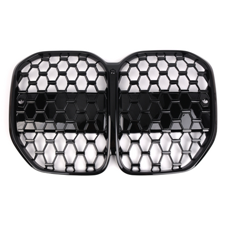 A black, honeycomb-patterned, dual-section car grille with a glossy finish lies against a plain white background, designed for automotive front-end ventilation and style enhancement.