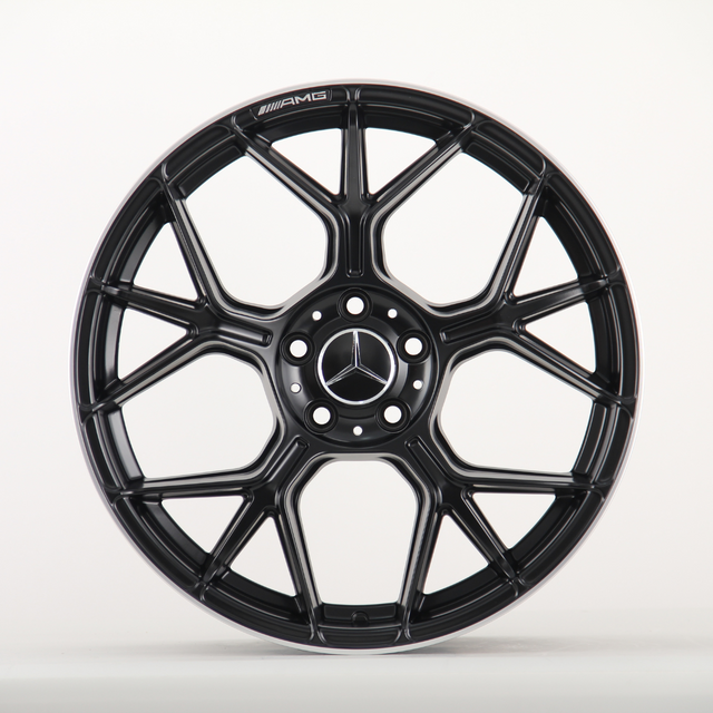 A black alloy wheel with a multi-spoke design, featuring the Mercedes-Benz logo at the center and "AMG" text, against a plain white background.