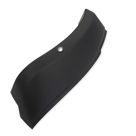 Curved black object with a smooth surface and a circular indentation, possibly a mounting hole, set against a plain white background.