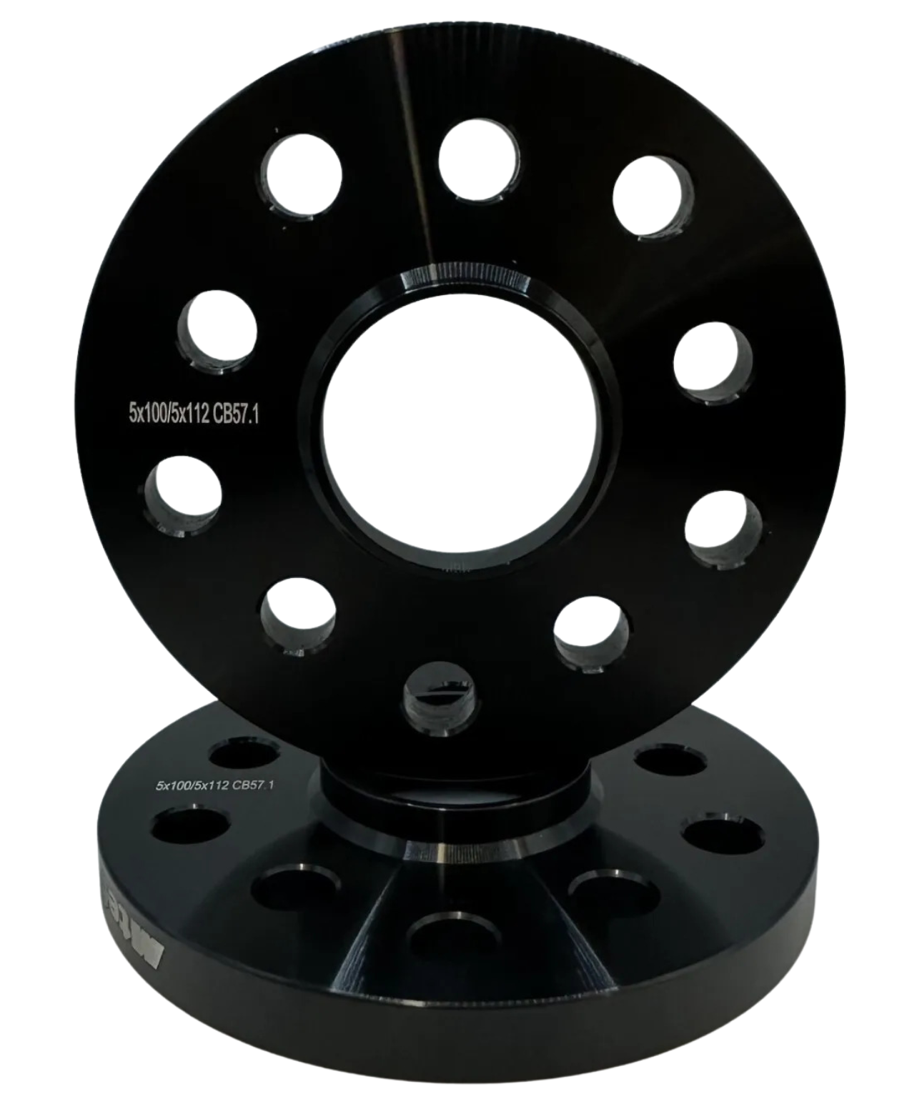 Two black, circular metal wheel spacers with multiple evenly spaced holes, stacked vertically. Text reads “5x100/5x112 CB57.1.” The background is plain white, emphasizing the products.