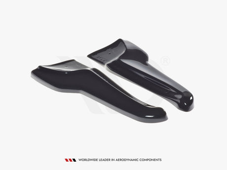Two glossy black aerodynamic components are positioned side by side on a white background. Text at the bottom reads: "WORLDWIDE LEADER IN AERODYNAMIC COMPONENTS."