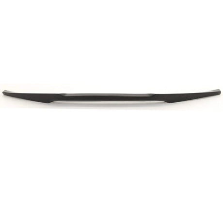 A long, sleek, black object, possibly an automotive accessory or trim piece, lies horizontally against a plain white background.