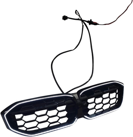 A black, hexagonal-patterned car grille with LED lights is connected to two wires. It is set against a plain white background.