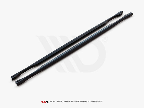 Two long, black, aerodynamic bars lie parallel on a white surface. A logo is subtly visible behind them. Text below reads: "WORLDWIDE LEADER IN AERODYNAMIC COMPONENTS."