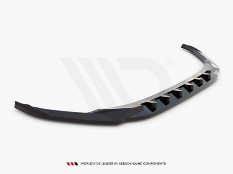 Curved black car spoiler resting on a plain white background. It features angular design elements for aerodynamic enhancement. Text reads: "Worldwide Leader in Aerodynamic Components" at the bottom.
