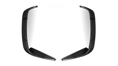 Two elongated, curved carbon fiber pieces rest symmetrically, facing each other on a plain white background.