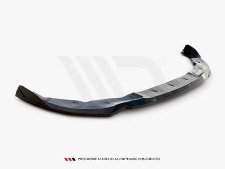 A sleek, black aerodynamic car lip spoiler rests on a plain white background. Text reads: "WORLDWIDE LEADER IN AERODYNAMIC COMPONENTS."