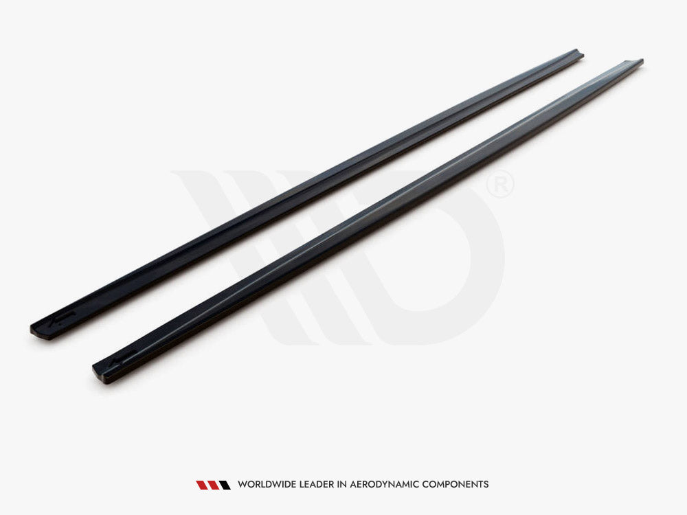 Two black, elongated strips are laid parallel on a light surface. Text reads, "WORLDWIDE LEADER IN AERODYNAMIC COMPONENTS."