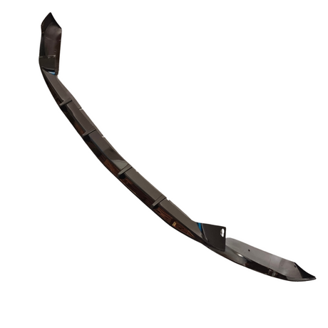 A sleek, black car bumper lip with angled segments resting on a white background, featuring a hole for attachment, likely enhancing vehicle aerodynamics.