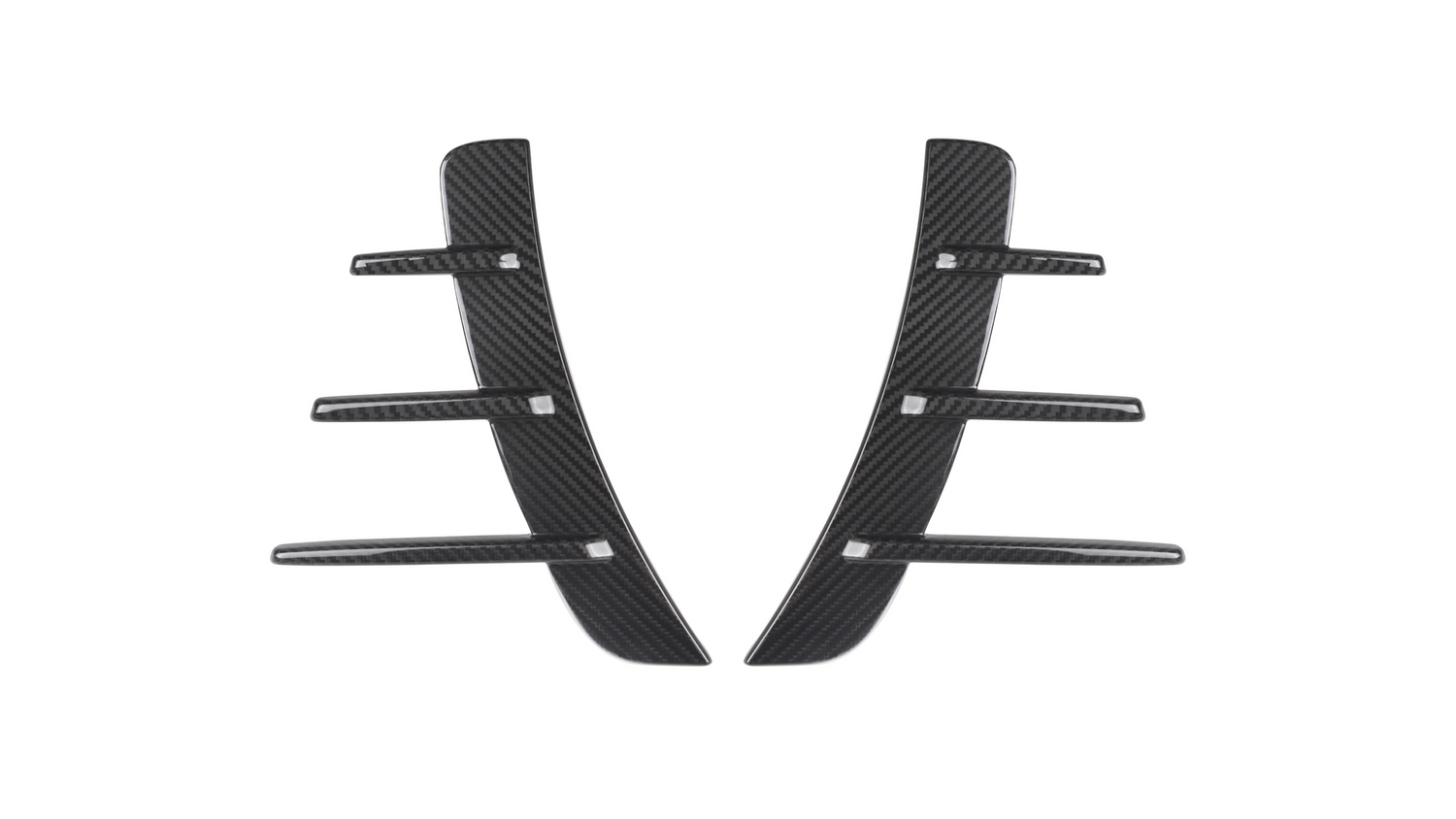 Two black carbon fiber pieces with three horizontal fins each are symmetrically aligned. They are set against a plain white background, suggesting automotive parts.
