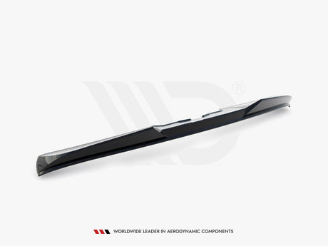 A sleek, black car spoiler lies on a plain white background. Below, the text reads: "WORLDWIDE LEADER IN AERODYNAMIC COMPONENTS."