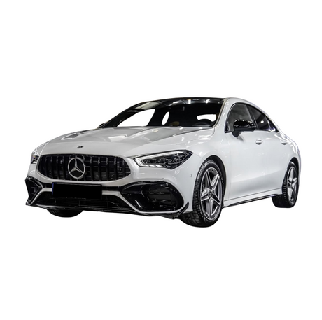 A white Mercedes sedan with a sleek design and star emblem grille is parked, showcasing its modern styling and five-spoke alloy wheels against a plain white background.