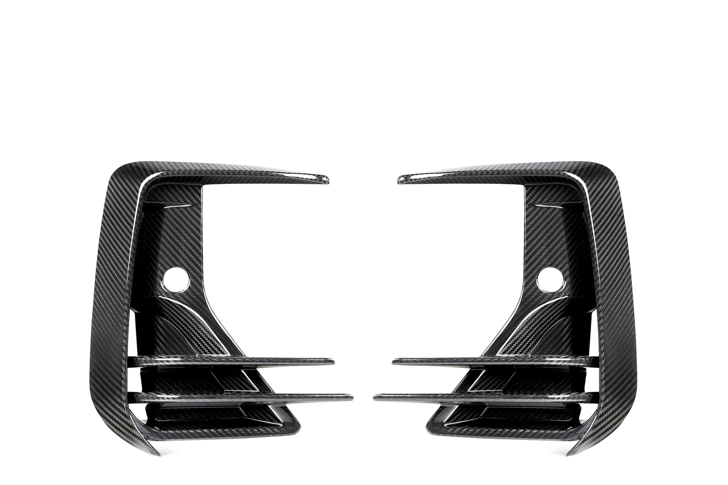 Two carbon fiber air vents, mirror each other, featuring three horizontal slats and a rounded hole in the center against a white background.