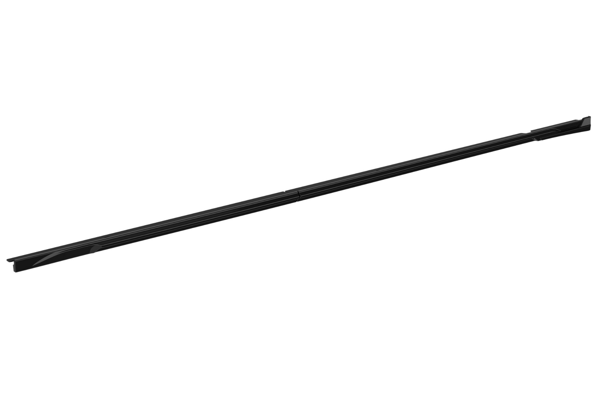 A long, slender black rod lies diagonally across a white background, featuring subtle grooves and tapered ends, suggesting a sleek, minimalist design.