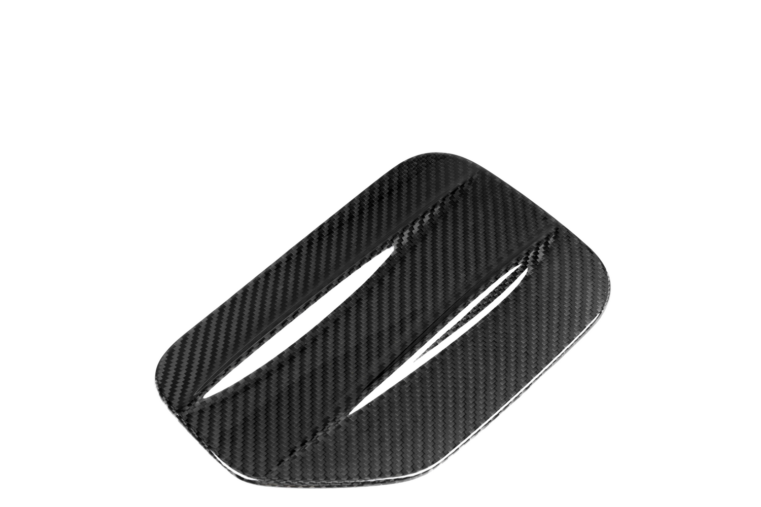 A rectangular, carbon fiber vent cover with two slits is angled diagonally against a plain white background.