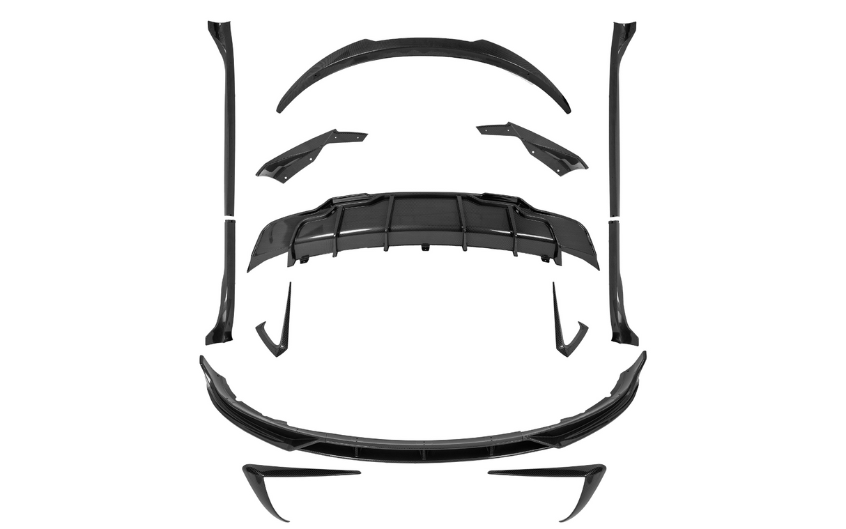 Carbon fiber car body kit parts, precisely arranged, suggesting assembly. Components include a diffuser, spoilers, side skirts, and splitters, placed on a plain white background.