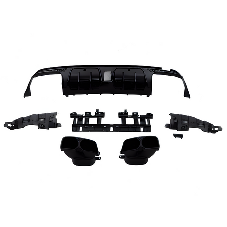 Automobile rear bumper diffuser parts, disassembled and laid out; includes end pieces, exhaust tips, and center grille. The components are black and arranged against a plain white background.