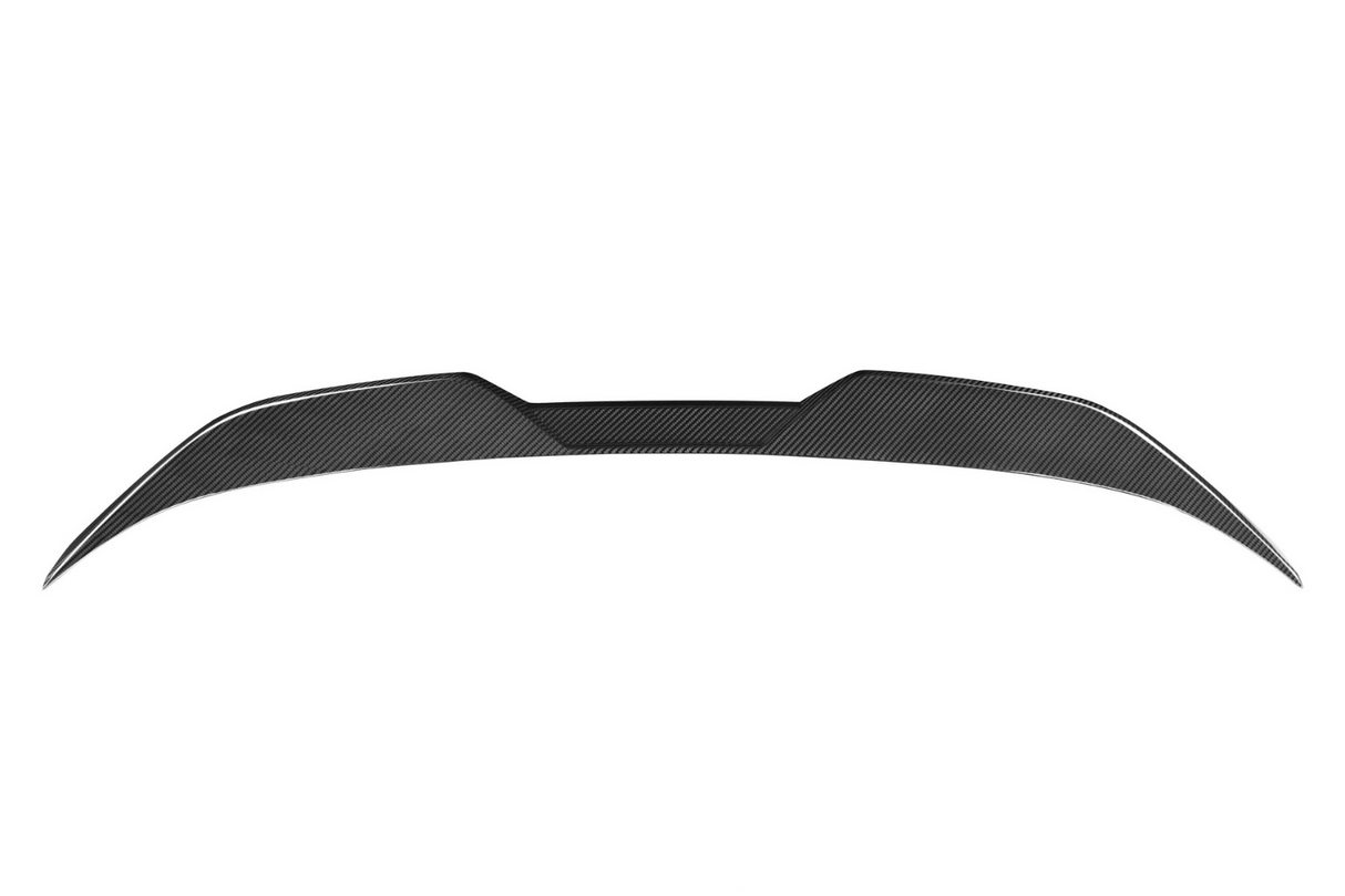 Carbon fiber car spoiler sits against a plain white background, showcasing its aerodynamic, sleek structure with upward-curving edges and textured pattern.