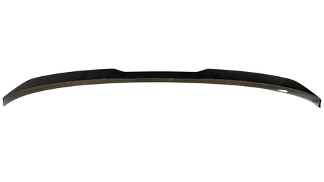 A black, curved car spoiler lies flat against a plain white background, showcasing its sleek aerodynamic design and glossy finish.