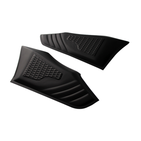 Two black, textured rubber pads feature a honeycomb pattern, lying side by side on a white surface, designed likely for gripping or protective use.