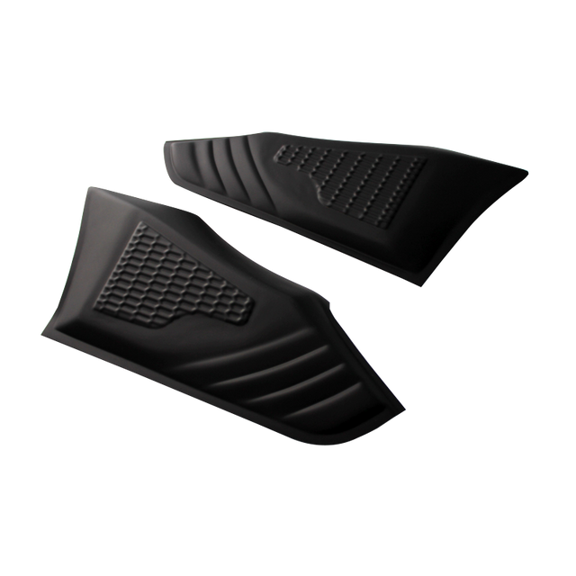 Two black, textured rubber pads feature a honeycomb pattern, lying side by side on a white surface, designed likely for gripping or protective use.