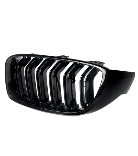 A glossy black car grille features vertical slats with a chrome finish, against a plain white background, designed for the front of a vehicle.