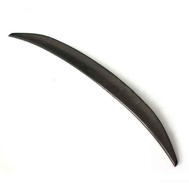 A sleek, lightweight carbon fiber car spoiler is shown, arched slightly, resting against a plain white background.