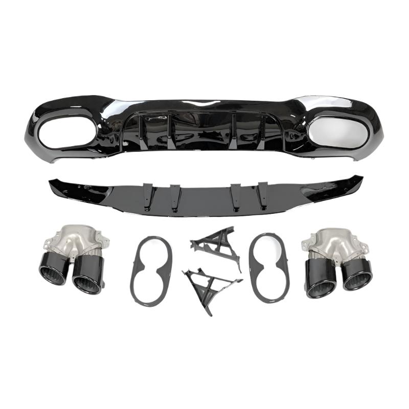 A collection of car diffuser components, including a glossy black bumper diffuser, quad exhaust tips, and supporting brackets, arranged on a plain white background.