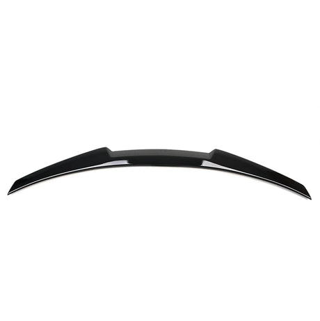 A sleek, black car spoiler is displayed against a plain white background, showcasing its curved design and aerodynamic features.