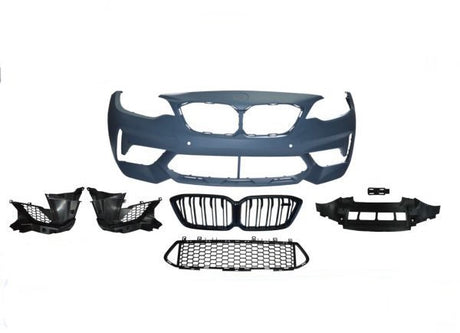 Car bumper kit displayed with grille, fog light holders, and mesh grille sections. Components are laid out symmetrically against a plain white background, showcasing automotive parts assembly.