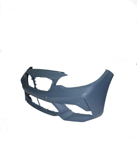 A blue-grey car bumper is displayed on a plain white background. It features openings for the grille and lights, with smooth contours for aerodynamics. No text is present.