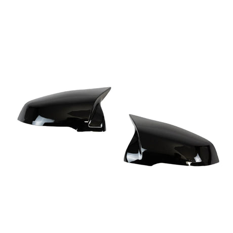 Two glossy black car side mirror covers, angled towards each other, are isolated on a white background. They are designed to fit over existing mirrors, offering a sleek, aerodynamic appearance.