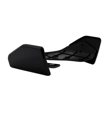 A black plastic car spoiler sits on a white background, featuring ridged surfaces and mounting holes, designed for aerodynamic enhancement.