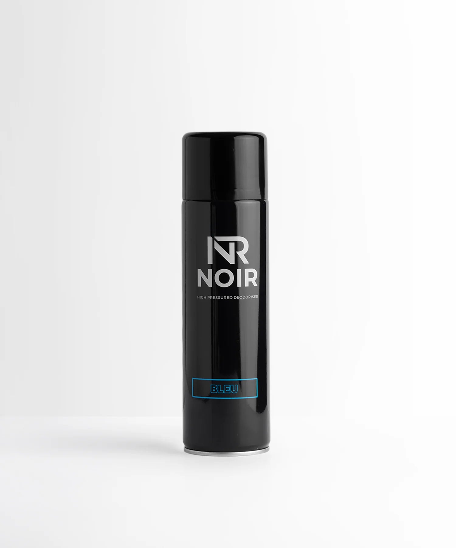 A black aerosol can stands upright on a white surface. It features text reading, "NR NOIR," "High Pressured Deodoriser," and "BLEU" in blue. The background is plain white.