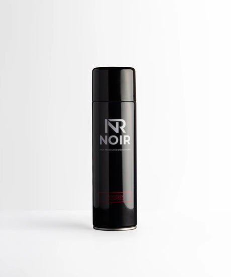 A black cylindrical aerosol canister labeled "NR NOIR HIGH PRESSURED DEODORISER" with the word "ROUGE" in red at the bottom, placed against a plain white background.