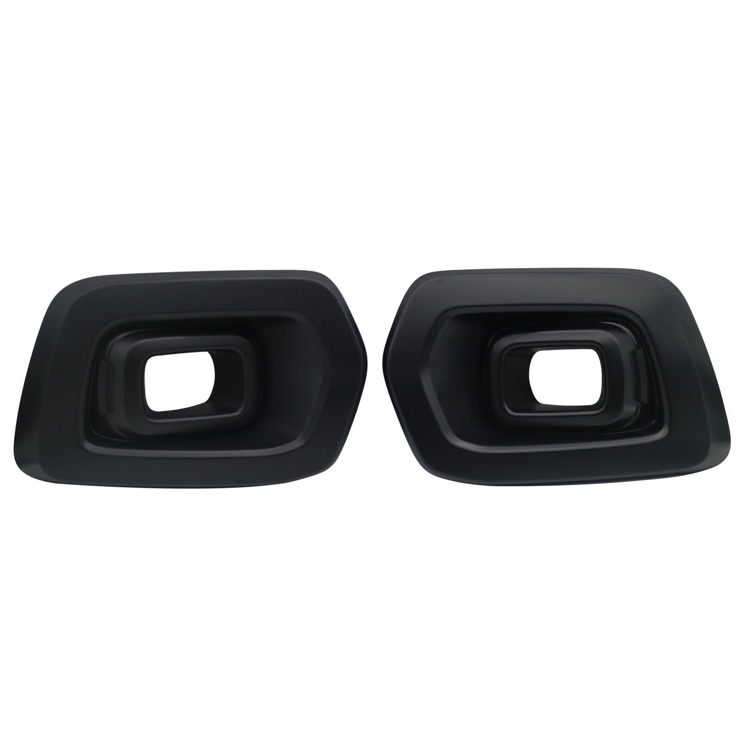 Two black exhaust tips with rectangular openings are facing forward. They are placed side by side against a plain white background.