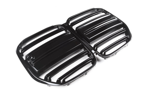 Black, glossy car grille displaying horizontal slats is placed on a plain, white background, suggesting a focus on automotive design and functionality.