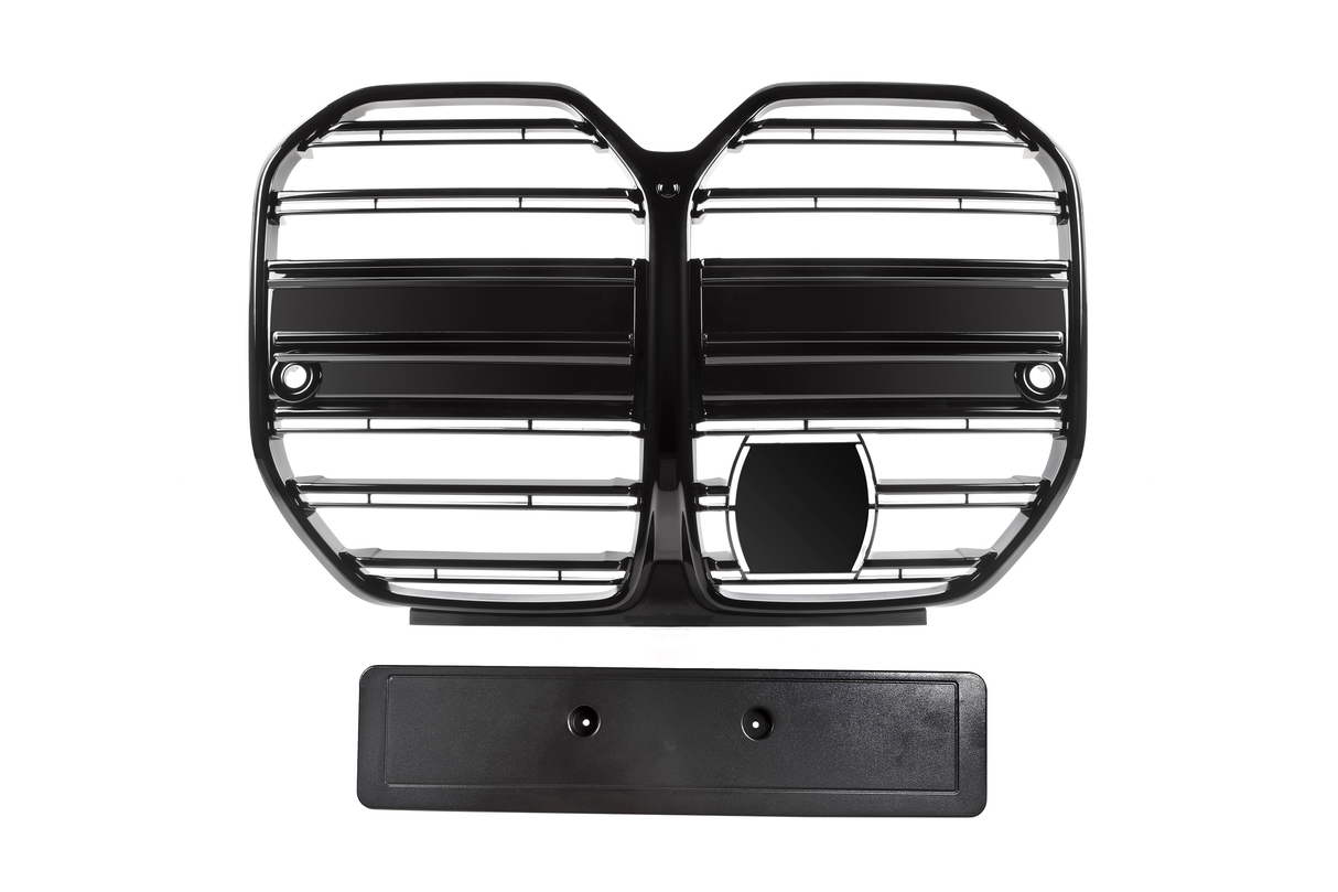 A black, horizontally-slatted car grille with an emblem space and a separate rectangular license plate holder are set against a plain white background.