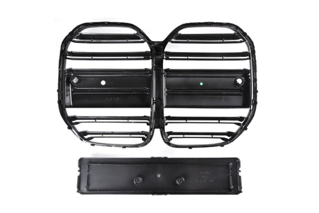 Black vehicle grill with horizontal slats and a rectangular mounting area below, set against a plain white background. Text reads “FK,” “BMW5,” and “FOR OE# 51117266199.”