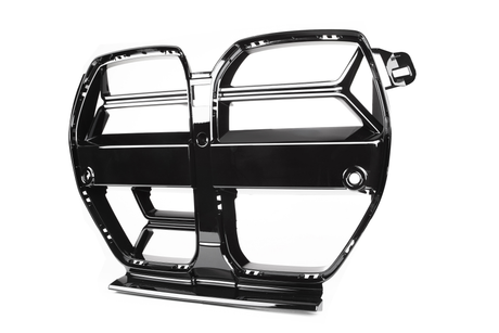 Black, shiny car grille featuring a symmetrical design with geometric cutouts, positioned against a plain white background.