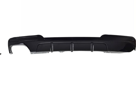 A black car bumper, featuring vertical slits for airflow, is displayed against a plain white background.