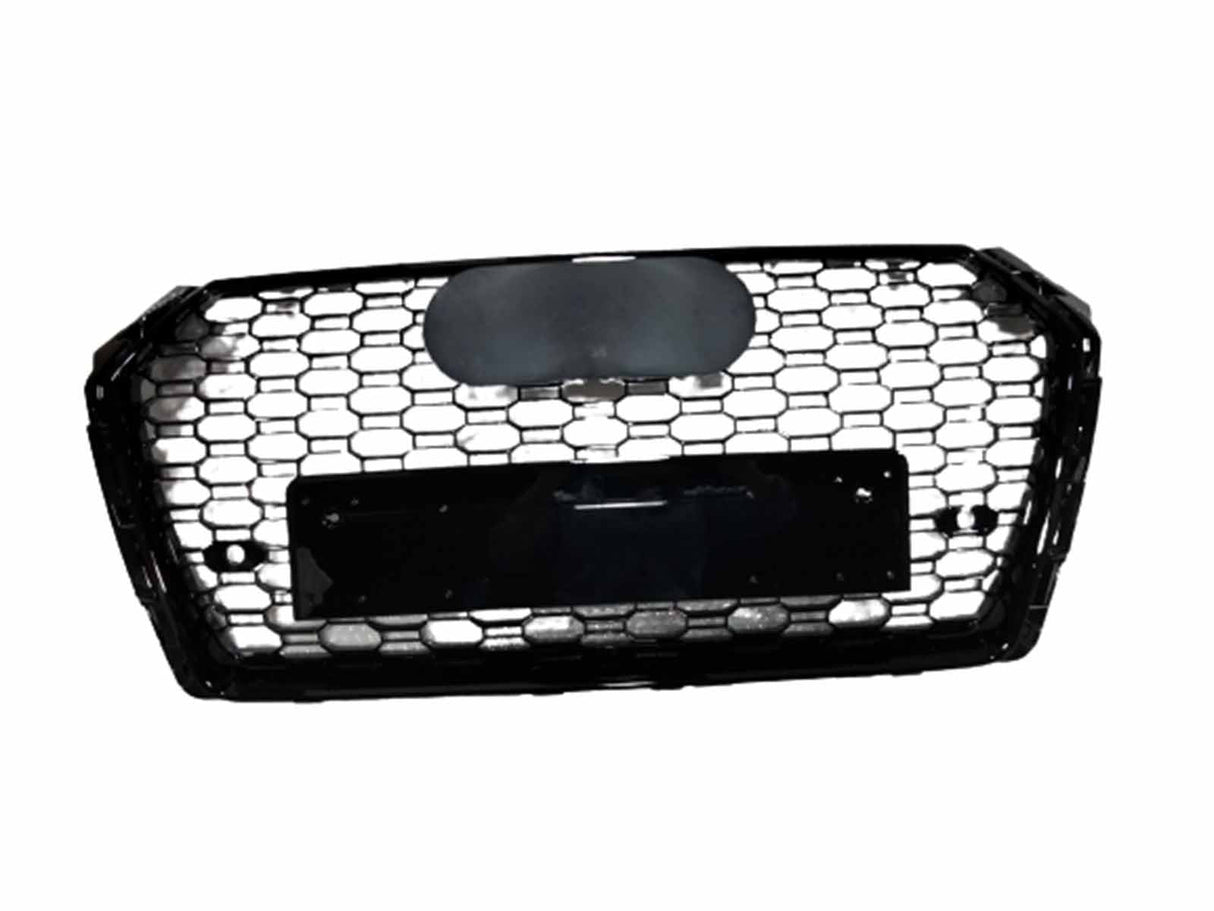 A black honeycomb car grille with a central blank emblem holder and license plate mount, placed against a plain white background.