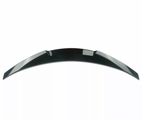 A shiny, black car spoiler curves upward against a plain white background, designed for aerodynamic enhancement and style.