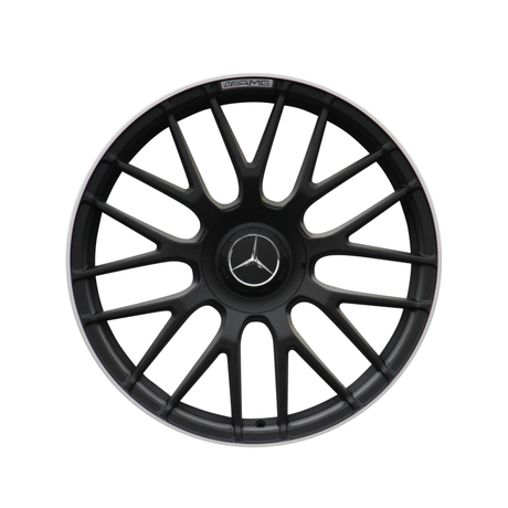 A black multi-spoke car wheel rim features a central Mercedes-Benz logo with the text "AMG" on the edge, set against a plain white background.